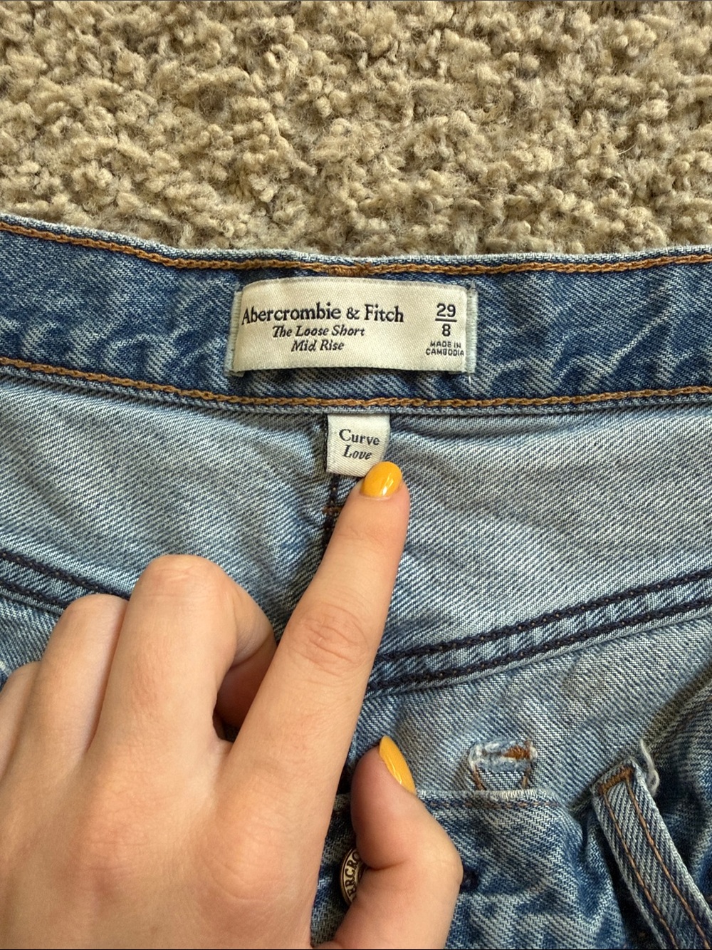 Mid-Rise Curve Love Light Blue Denim Cutoff Shorts with Frayed Hem - Picture 2 of 3